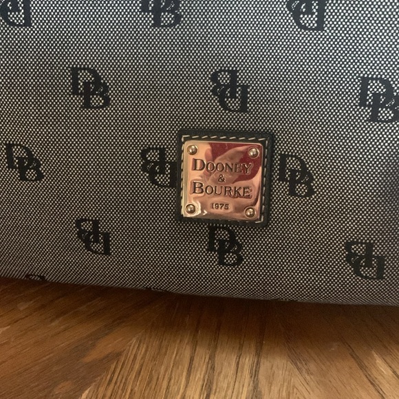 Dooney and Bourke in the classic DB pattern. Navy with pink inside - Picture 2 of 7
